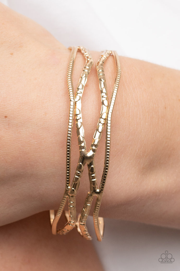 A Narrow ESCAPADE Paparazzi Gold Bracelet